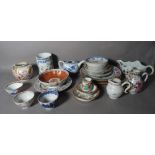 A quantity of Asian ceramics, mostly 18th century Chinese export porcelain,