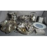 A large quantity of silver and plated items, including various trays, kettle on stand, wine coolers,