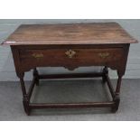 A late 17th century oak lowboy, the moulded rectangular top above a frieze drawer,