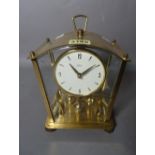 A modern stylised anniversary type mantel clock by 'KUS-MIV', Germany, 24cm high.