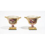 A pair of Barr, Flight & Barr Worcester two- handled pink- ground urns, circa 1810,