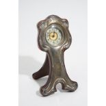 A silver fronted wooden cased strut backed clock, of Art Nouveau design,
