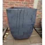 A large modern garden pot, 65cm wide x 91cm high.