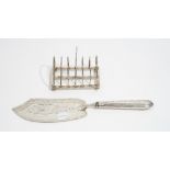 Silver, comprising; a Victorian seven bar toastrack, having a loop handle,