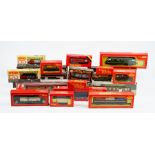 A group of boxed locomotives and tenders, including a Hornby OO gauge Wrenn, Lima and Mainline.