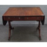 A George III mahogany sofa table, with opposing opposite frieze drawers, on four downswept supports,