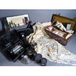 A quantity of early 20th century medical supplies in cases, (qty).