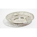 A German oval centrepiece dish, embossed and pierced with fruit, flowers,