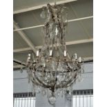 A large gilt metal, glass and cut glass chandelier in the the 18th century style,