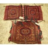 A Tekke Turkman cover, a central gul with minor borders, slit tassels, 53cm x 60cm,