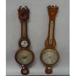 An Edwardian mahogany and inlaid banjo shaped wall barometer, 97cm high, and another similar,