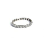 A diamond full eternity ring, mounted with cushion shaped diamonds, ring size L.