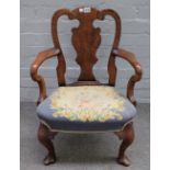 A 19th century child's walnut vase back open armchair, of Queen Anne design, 48cm wide x 69cm high.