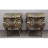 A pair of zebra print decorated bombe two drawer chests, on outswept supports,