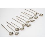A collection of 12 Russian silver spoons, third quarter 19th century, some dated 1882,