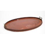 A 19th century satinwood banded mahogany oval serving tray, 67cm wide,