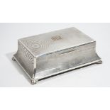 A silver table cigar/cigarette box, of swept rectangular form,