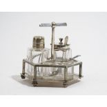 A Victorian plated condiment stand, detailed Designed by Dr C.