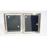 A silver mounted rectangular photograph frame, decorated with a beaded border,