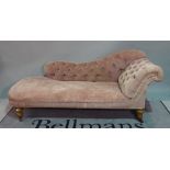 A late Victorian mahogany framed chaise longue buttonback upholstery on tapering supports,