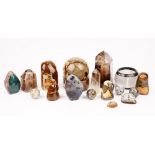 A collection of polished minerals, to include three quartz prisms,