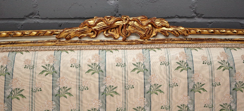 A Louis XVI style painted and gilt framed upholstered settee, 19th century, with ribbon mouldings, - Image 3 of 4