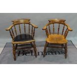 A near pair of ash and elm open armchairs on turned supports, 64cm wide x 81cm high (2).