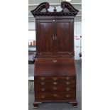 A George III mahogany bureau bookcase,