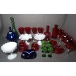 A quantity of modern decorative coloured glass, including vases, drinking glasses and sundry.