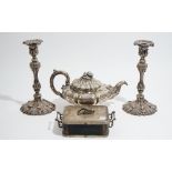 A group of plated wares, comprising; a rectangular twin handled lidded dish,