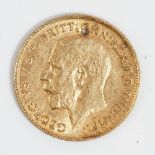 A George V half sovereign 1912, (pierced with a hole).