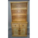 An early 20th century pine dresser,