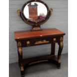 An Empire ormolu moulded mahogany dressing table,