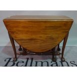 A George II and later style mahogany drop flap gateleg dining table,