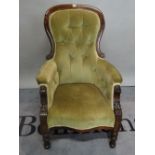 A late Victorian mahogany framed spoonback armchair with button upholstery, 68cm wide x 103cm high.