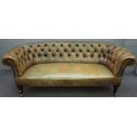 A Victorian style green leather upholstered tub back Chesterfield style sofa,