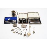 A group of silver and plated wares, comprising; a three piece shoehorn and button hook set,