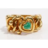 An 18ct gold and emerald ring dress ring by Garrard Of abstract heart design,