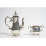 A silver coffee pot, together with a matching twin handled silver sugar bowl, each of baluster form,