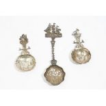 A Dutch silver spoon, the pierced bowl decorated with a figure holding buckets,