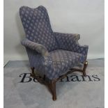 A late 19th century mahogany framed Continental blue upholstered armchair,