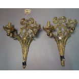 A pair of modern twin branch wall lights, with rams head decoration, 22cm wide x 37cm high.