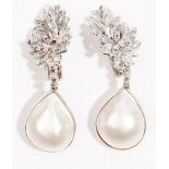 A pair of mabé cultured pearl and diamond-set pendent earrings The floral spray earclips set
