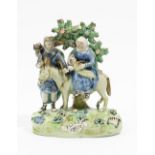 A Walton pearlware group of `Flight To Egypt', circa 1820-30, of traditional form,
