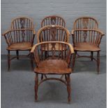 A set of three ash and elm Windsor elbow chairs, 19th century, with pierced splats,