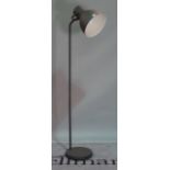 A modern black painted metal standard lamp, 185cm high.