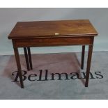 A George III style mahogany foldout tea table, on square supports, 90cm wide x 71cm high.