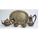 Asian tea wares, comprising; a shaped oval tray, having a decorated border, detailed Silver,