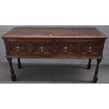 A late 17th century oak low dresser,