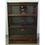 The Globe Wernicke Co Ltd; an oak three tier glass fronted bookcase, 87cm wide x 125cm high.